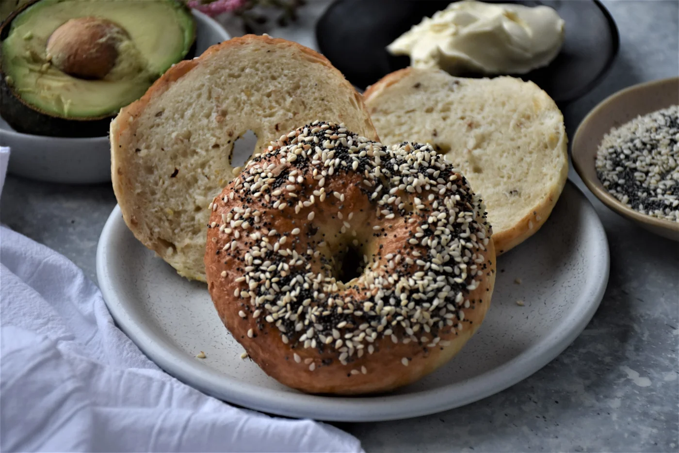 one whole, one sliced bagel